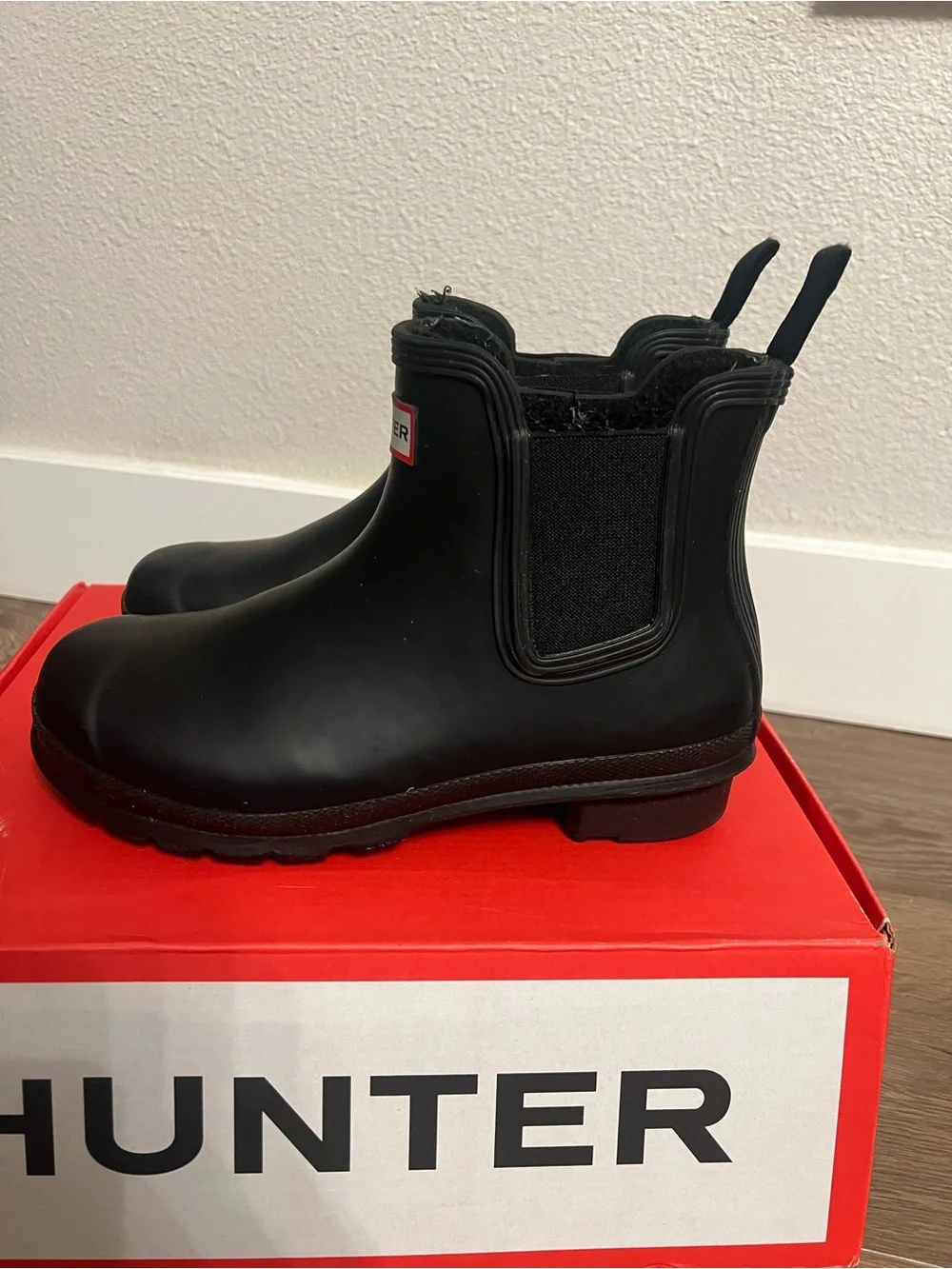 Hunter Women’s Black Chelsea Rain Boots with Red Logo